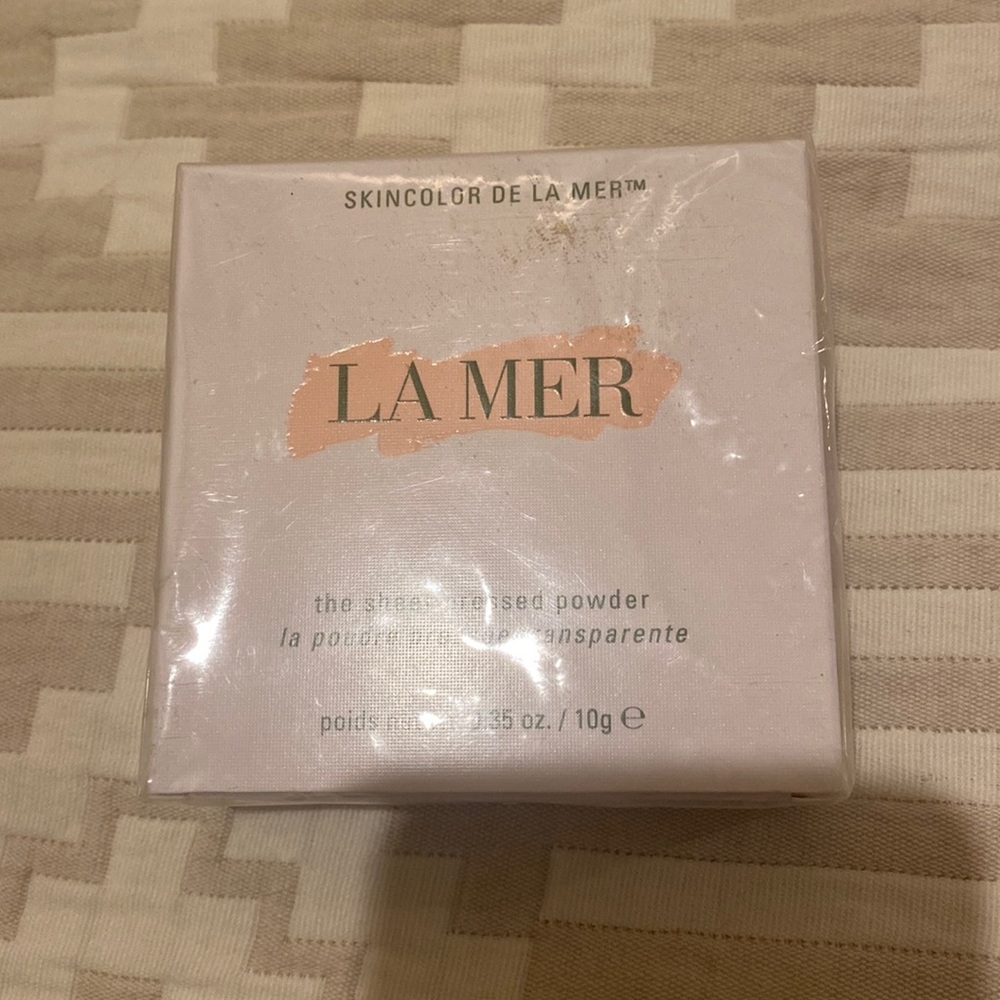 La mer sheer pressed powder color light 12